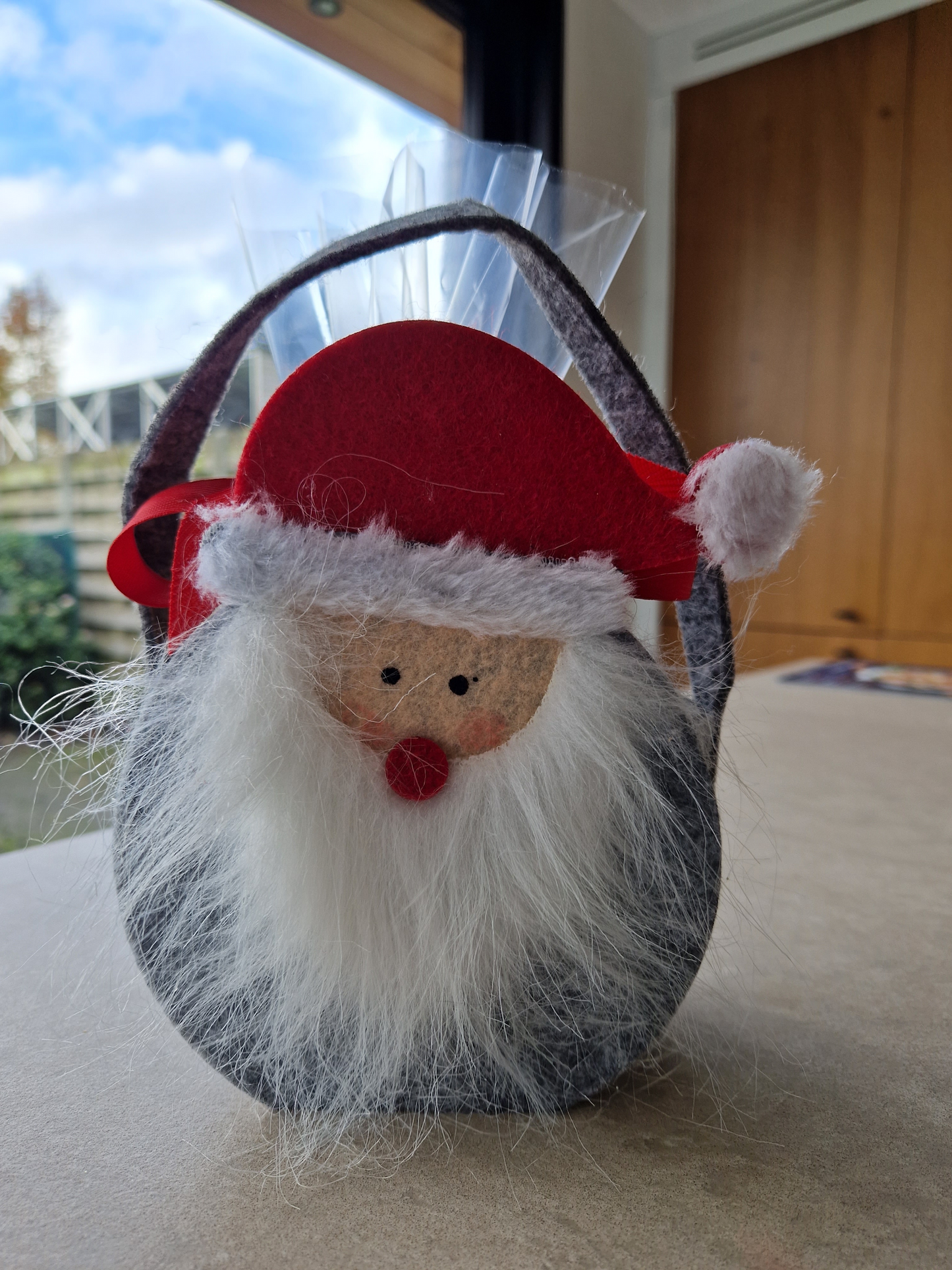Vilten Kerstman met snoepjes
